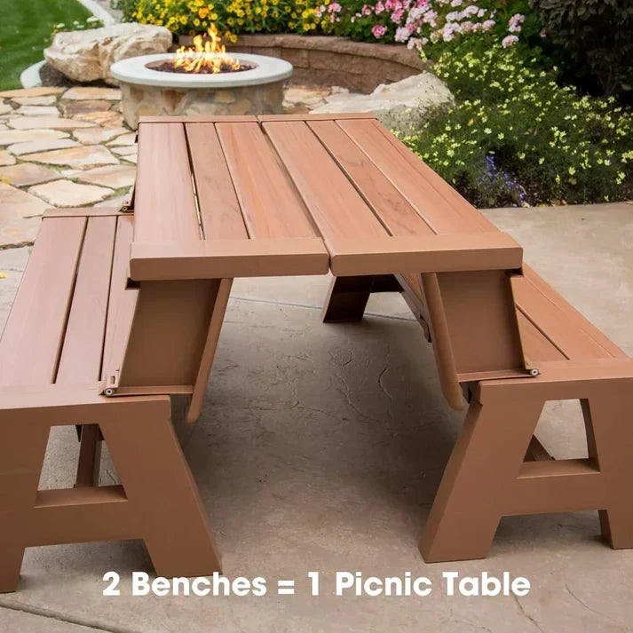Two Wood benches folded together into a picnic table beside a fire pit