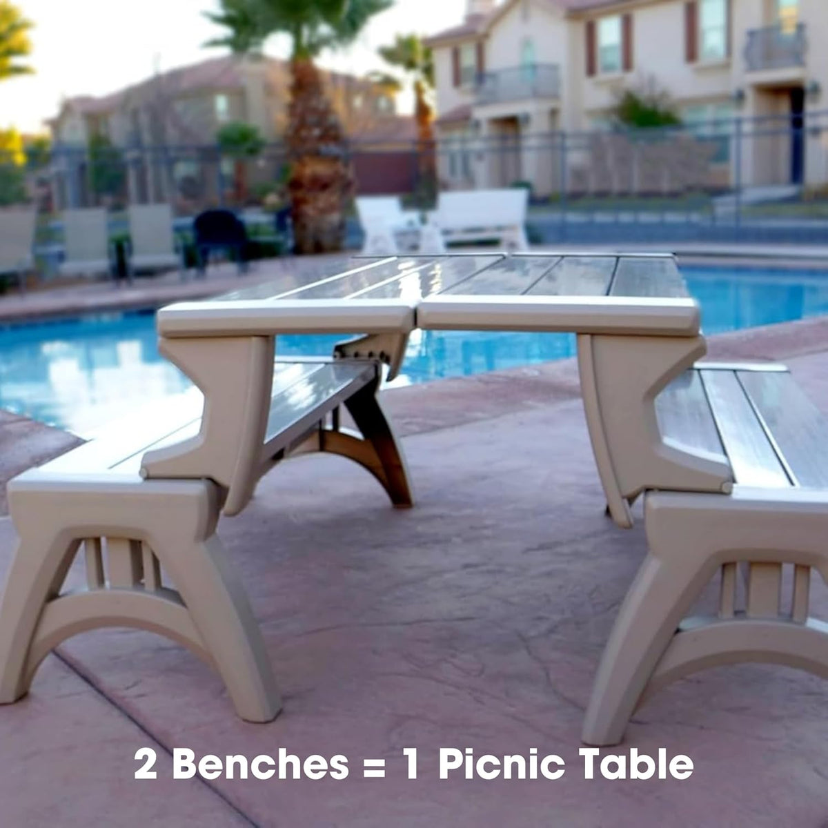 Two Beige benches folded into one picnic table beside a pool