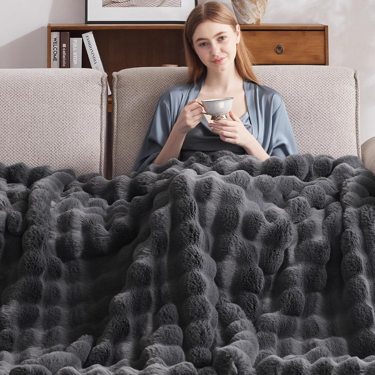 Relaxing on the sofa under the Dark Grey heated blanket