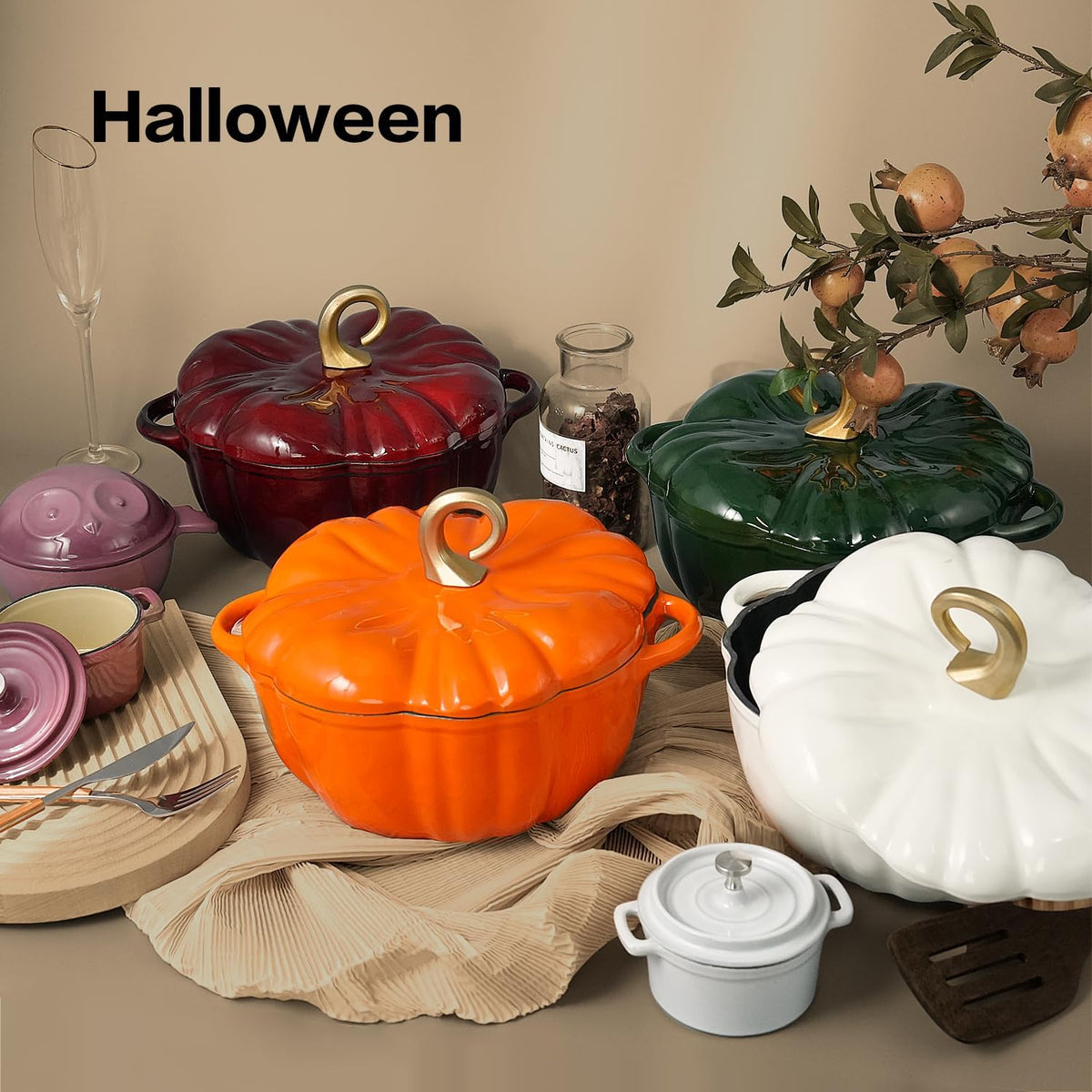 Orange, Green, Red and White pumpkin Dutch ovens on a fall table
